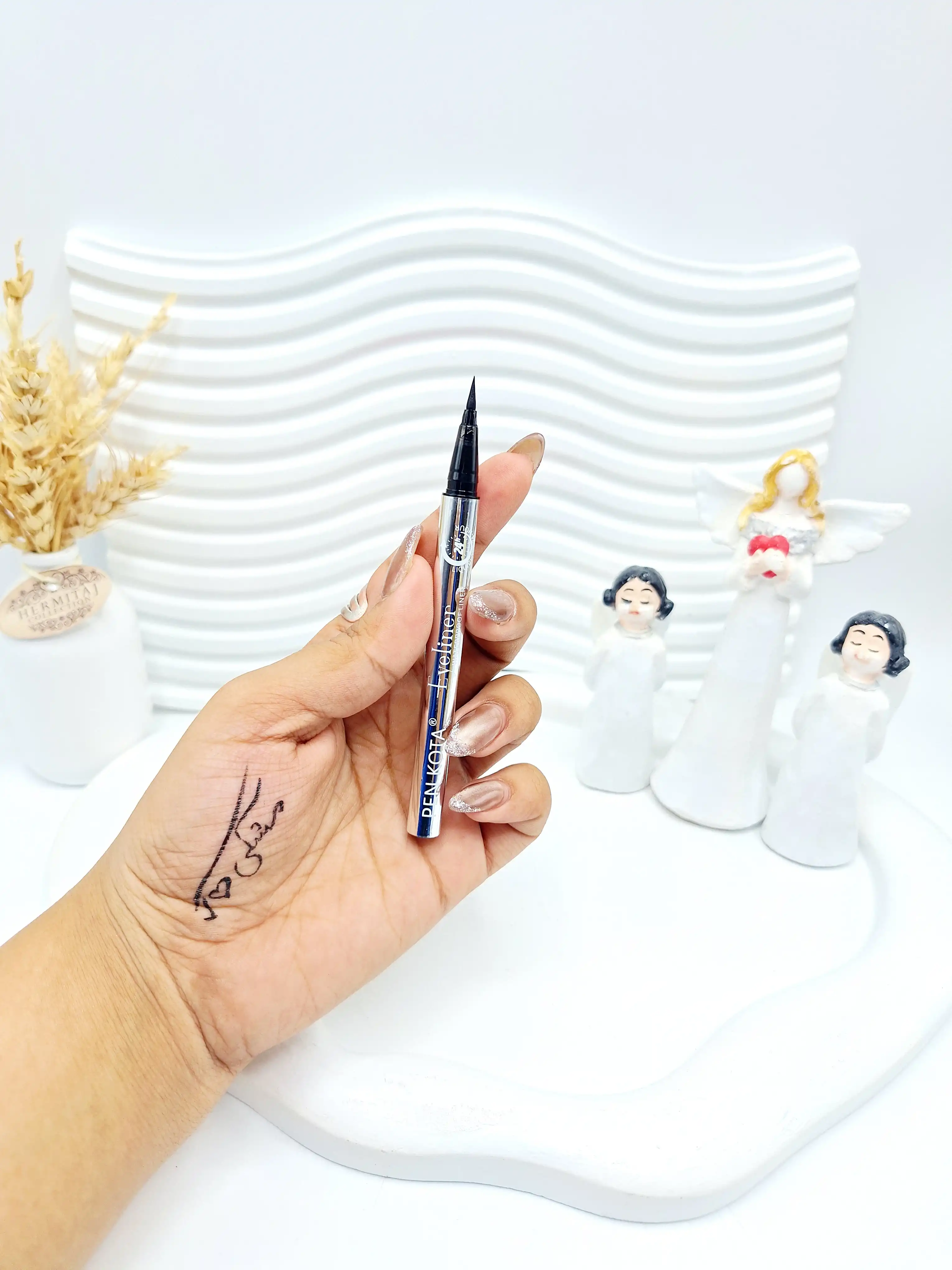 خط چشم مشکی  پوکه نقره ای با کیفیت ضد آب برند PEN KOTA کد 005